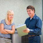 woman and hvac repair man