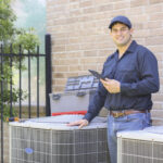 Man standing by and AC unit