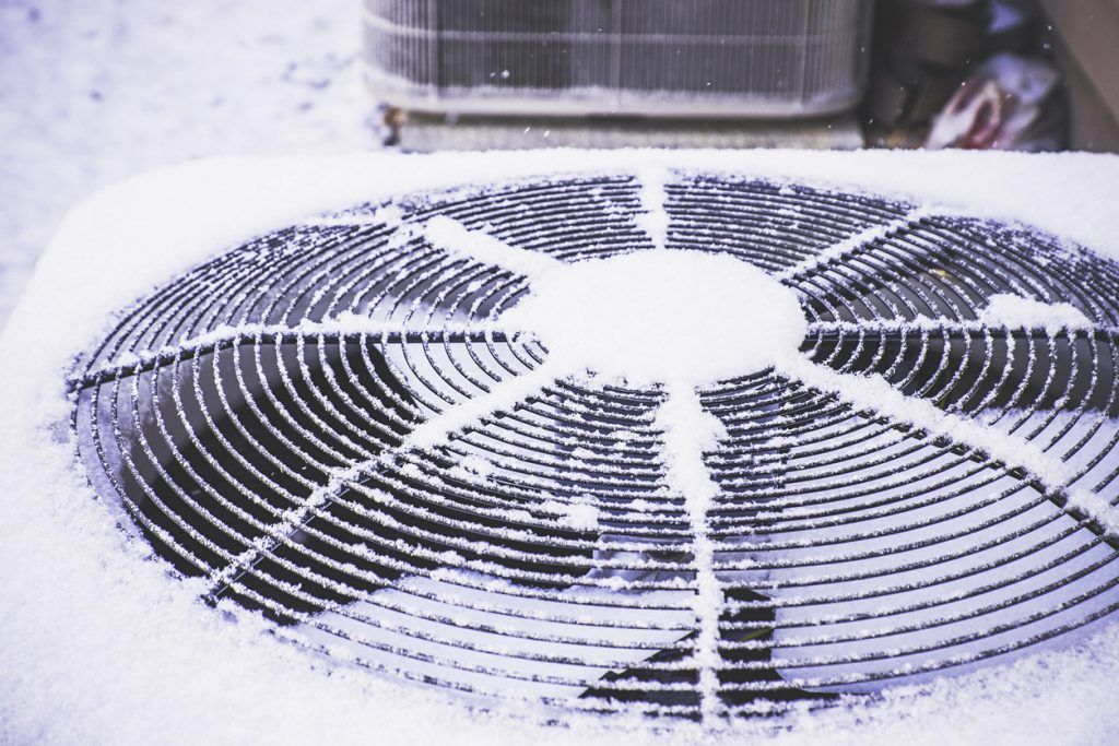 hvac system out in the winter snow