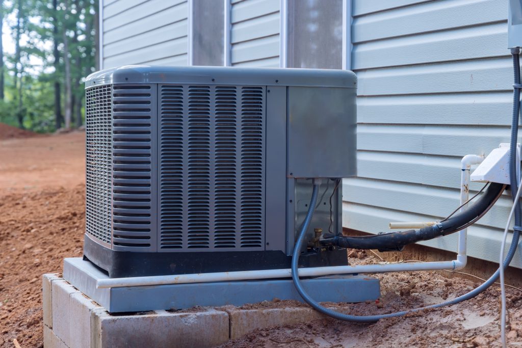 Outside,Installation,Of,An,Electric,Air,Conditioner,On,Exterior,A new hvac system